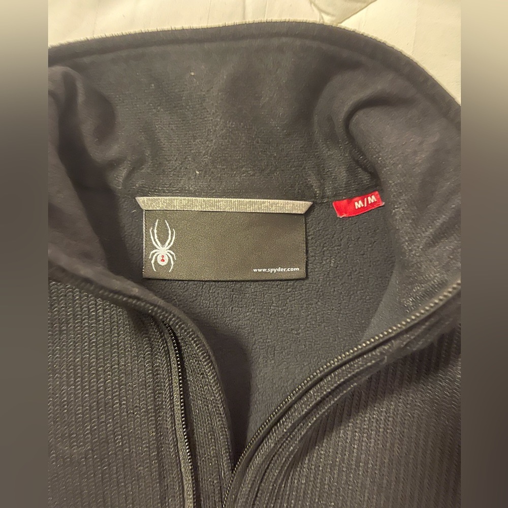 Lightly worn ladies full zip black spyder jacket